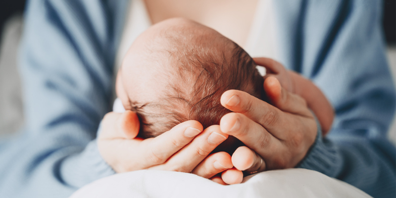 Newborn with mother