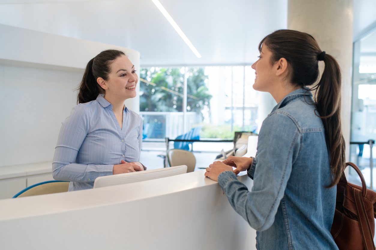 Woman reading Fertility Treatment brochure